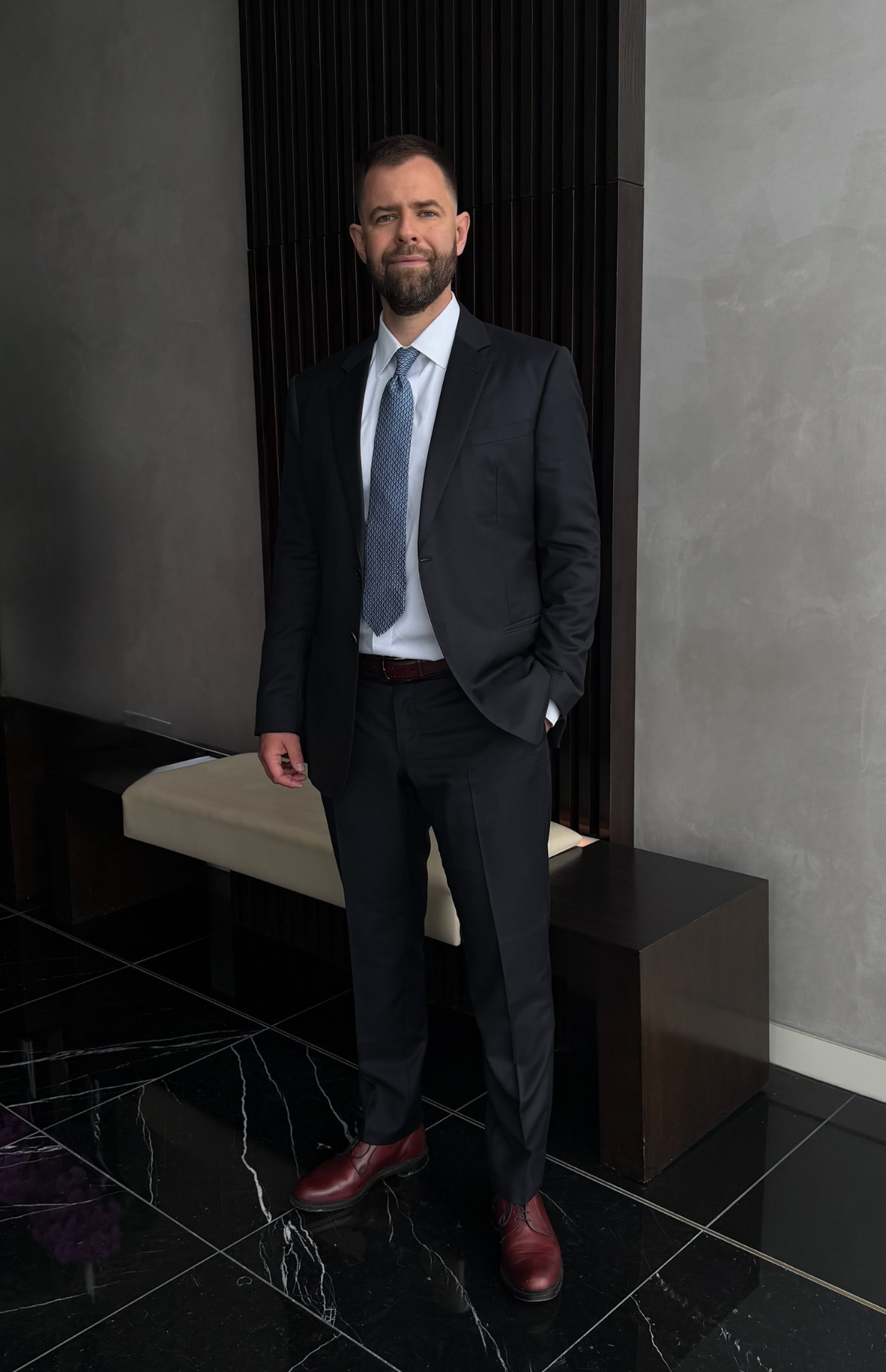 Pavlo Buryi, economic consultant, in a modern office